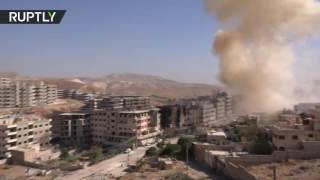 Сирийская армия сражается с боевиками в пригороде Дамаска