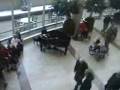 Andy Bollig playing Christmas music at the Mayo Clinic part 2