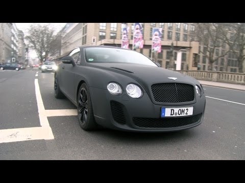 Matte black Bentley Continental SuperSports driving in D sseldorf