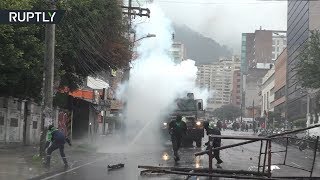 «Коктейли Молотова» и водомёты: в Боготе студенты устроили акцию протеста (10.05.2019 13:23)