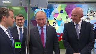 Путин и Инфантино получили паспорта болельщиков