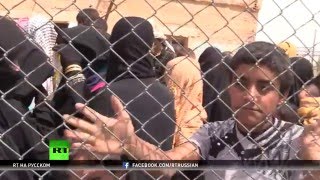«Боевики ИГ морили нас голодом и убивали»: бегущие от террористов иракцы нашли пристанище в Сирии