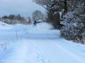 Toyota Dyna Snowplowing a village road