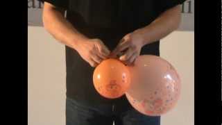 What happens when air is blown between the two inflated balloons hanging by  strings.