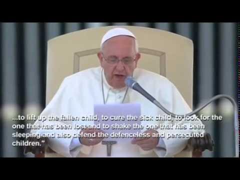 (Pope Francis)   embraces Iraqi Christians at weekly audience   9/3/14