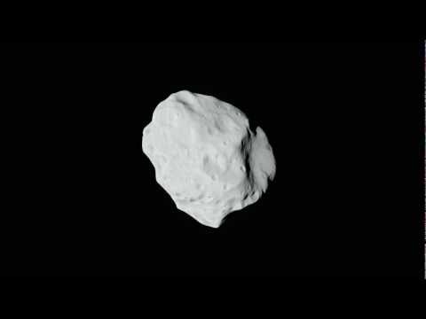 Rosetta flyby of asteroid Lutetia -- EXTENDED -- YouTube