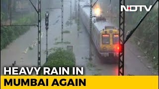 Heavy Overnight Rain In Mumbai, Tracks Flooded, Trains DelayedHeavy Overnight Rain In Mumbai, Tracks Flooded, Trains Delayed