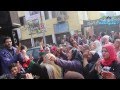 رقص على أنغام الدى جى أمام أحدى لجان الإستفتاء على الدستور بالفيوم