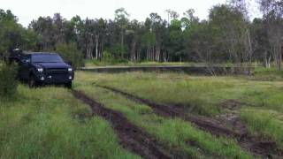 F550 Hauling a Gooseneck Trailer though the mud