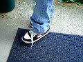 Image Tieing Shoes With No Hands