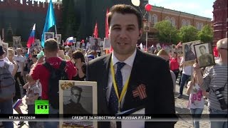 Корреспондент RT принял участие в шествии «Бессмертного полка» в Москве