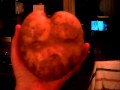 Giant heart winking kissy lip potato.