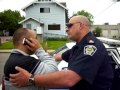 Police arrest man under pretense of law to incite violence.