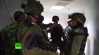 Видеокадры обыска израильскими военными здания медиакомплекса Palmedia, где расположен офис RT