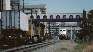 Amtrak's California Zephyr,  #5 passes UP trailer train at street level in Reno, NV