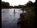 Robin and Janie fighting at the River.