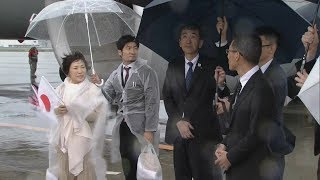 Выйти сухим: как лидеры G20 спасаются от ливня в японской Осаке (28.06.2019 14:30)