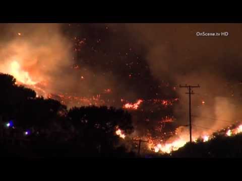 Calif. Wildfire Burns 10-mile Path to Pacific