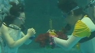 زواج تحت الماء فى الصين  زواج تحت الماء فى الصين