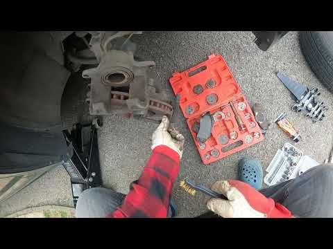 Come sostituire le pastiglie dei freni anteriori della Chrysler Grand Voyager