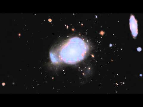 Violent Galaxy Collision Creates Beautiful 'Cosmic Bloom'  | Video - UCVTomc35agH1SM6kCKzwW_g