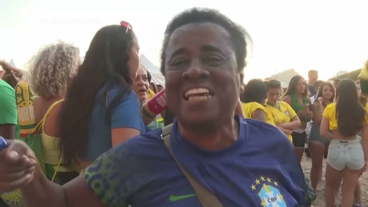 Brazilian fans cheer victory over Serbia at World Cup