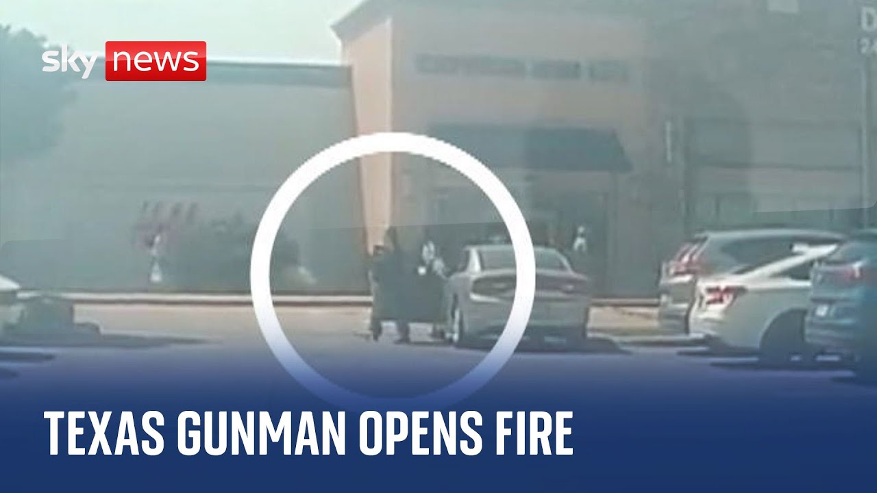 Moment Texas gunman steps out car and shoots at people outside shopping mall in Dallas