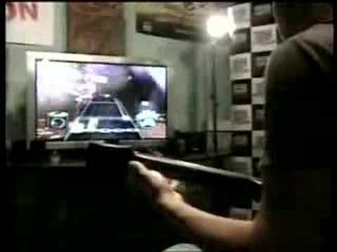 Guitar Hero World Record (CBS News) - UClzCn8DxRSCuMFv_WfzkcrQ