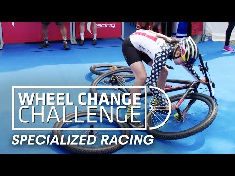 MTB Team "Specialized Racing" does the Wheel Change Challenge. | UCI MTB 2018 - UCblfuW_4rakIf2h6aqANefA