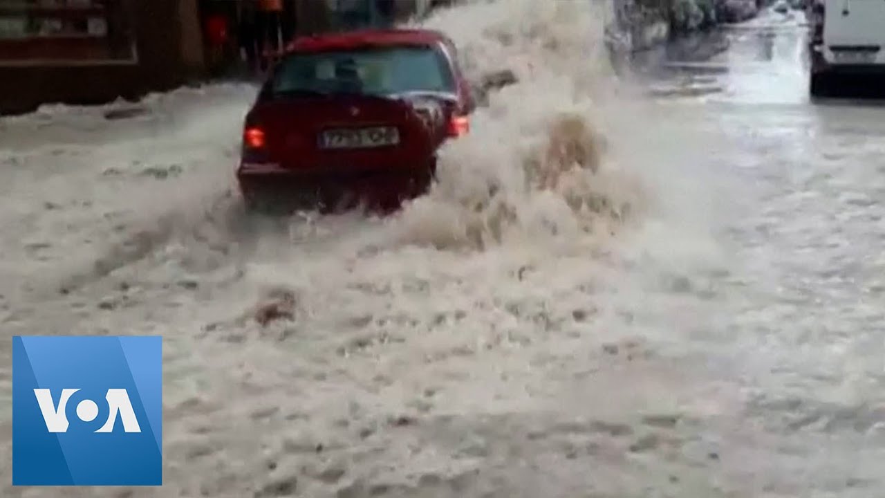Driver Swept Away by Floodwaters in Spain | VOA News