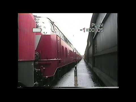 Eine z-gestellte 218 bringt ihre ausgemusterten Schwestern nach Seelze, 225er,Holzroller 2006