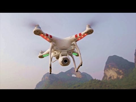 DJI Phantom 2 + S1000 With Amazing Aerial Sample! (CES 2014) - UCsTcErHg8oDvUnTzoqsYeNw