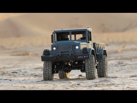 Electric 4WD RC Military Truck transporting Sand and Rocks - UCsFctXdFnbeoKpLefdEloEQ