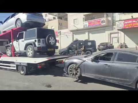 תיעוד תפיסת עשרות מנועי רכב במכולה וכלי רכב גנובים שהוסתרו