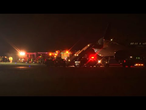 Delta plane carrying Panthers players slides off taxiway at Charlotte Douglas International Airport