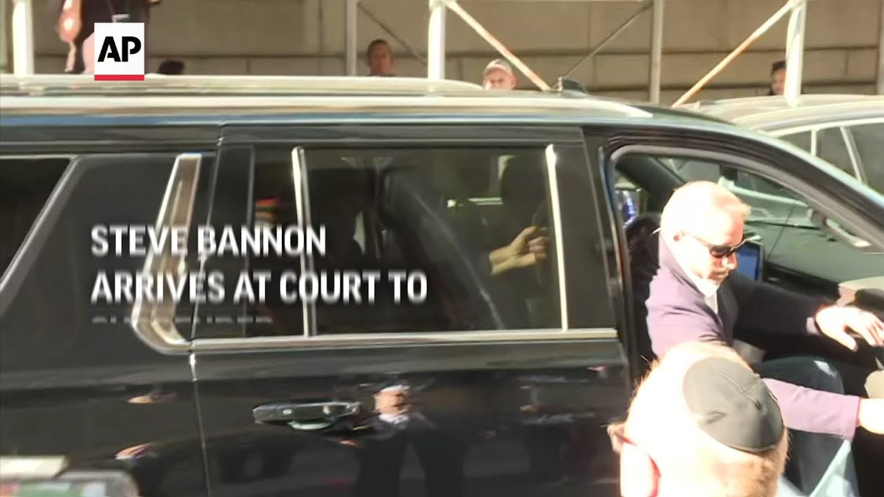 Steve Bannon arrives at court to surrender