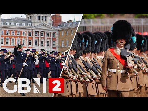 VE Day celebrations: Military procession marches through streets of London in stunning display