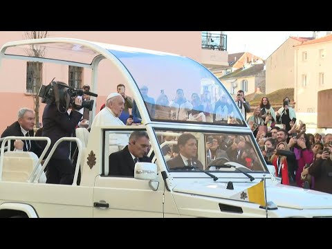 Pope Francis begins Corsica visit through the streets of Ajaccio in his Popemobile | AFP