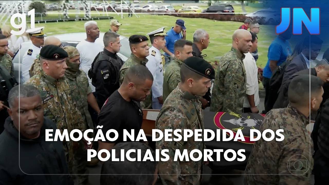 Jornal Nacional policiais mortos em operação contra o Comando Vermelho são enterrados  TV Online Jornal Nacional policiais mortos em operação contra o Comando Vermelho são enterrados