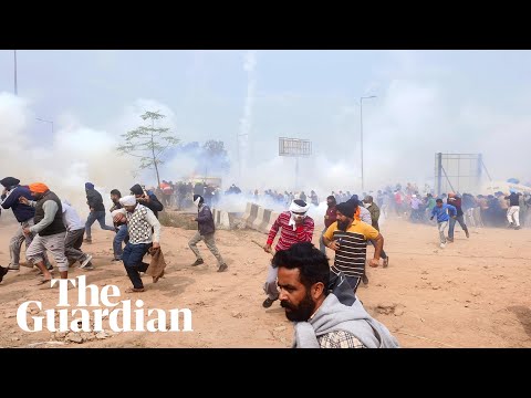 Indian police fire water cannon and teargas at protesting farmers