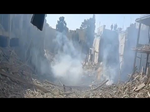 Iran state TV shows destruction at strike site | AFP