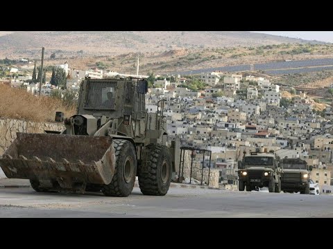 Israeli army vehicles deploy in West Bank camp after deadly raid | AFP