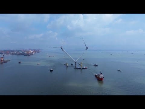 Gigantic floating wind power platform sets sail in south China