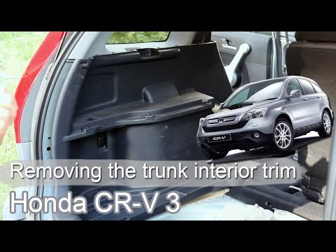 Come smontare il pannello laterale del bagagliaio nella Honda CR-V?