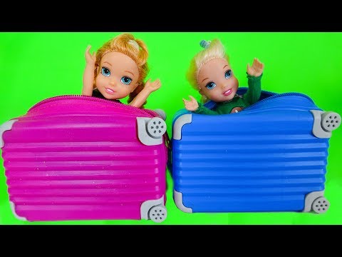Elsa and Anna toddlers buy suitcases to go on holidays - UCB5mq0ucfGe9dNCIC0s41QQ