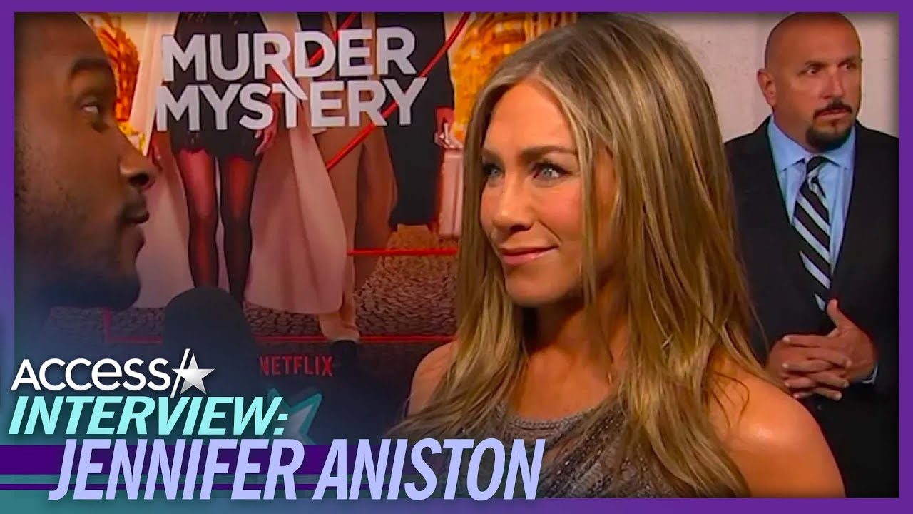 Jennifer Aniston Rips On Adam Sandler For Wearing Hoodie To ‘Murder Mystery 2’ Premiere