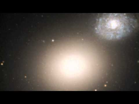 Hubble Snaps A Peculiar Galaxy Pair | Video - UCVTomc35agH1SM6kCKzwW_g