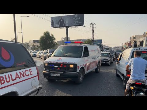 Ambulances carrying wounded and killed Lebanese soldiers arrive at hospital after blast | AFP