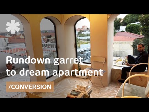 Rundown garret becomes a tiny penthouse perching over Lisbon