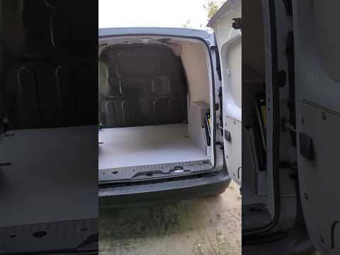 Transforming a 5yr old Kangoo electric van with new polpropylene lining in the rear